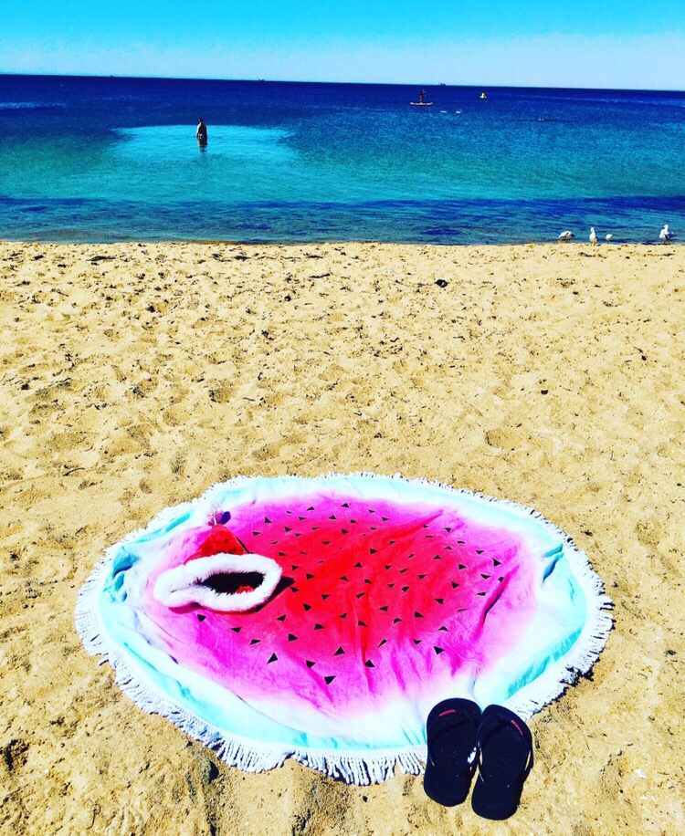 Watermelon towel at beach